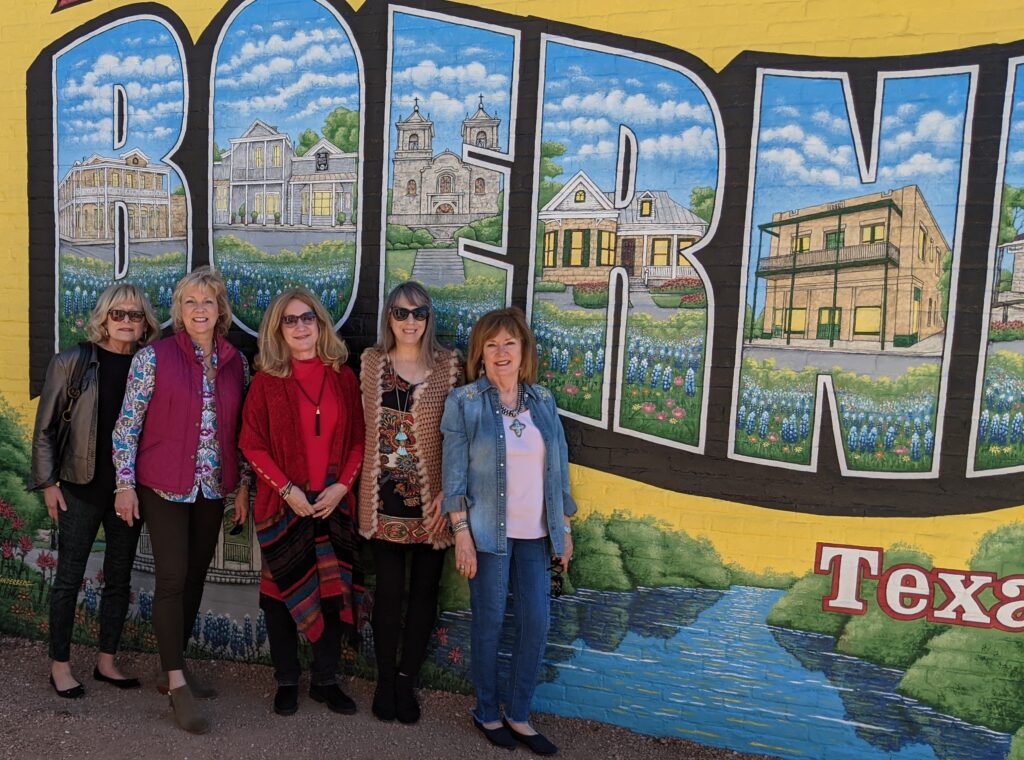 5 women in front of the Boerne sign