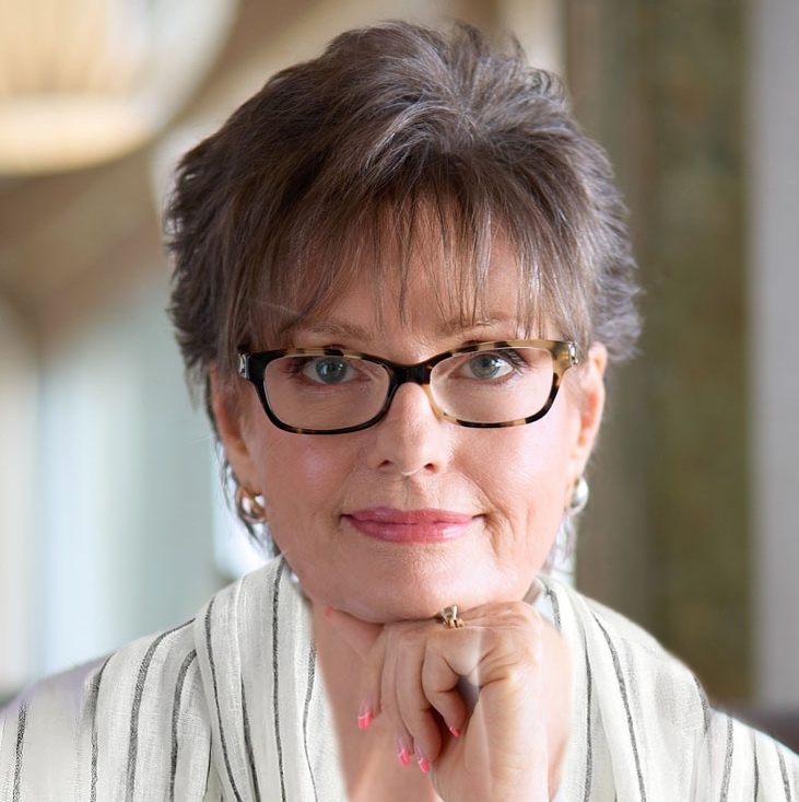 brunette woman with glasses