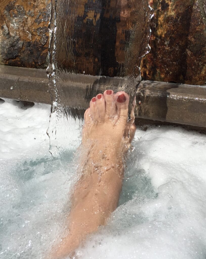 Photo of a foot with water running over it