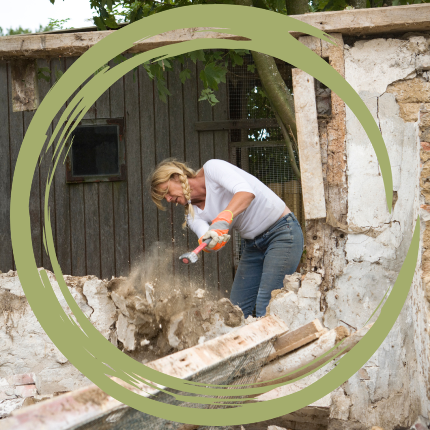Woman smashing through a wall